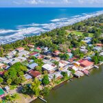 You'll boat from the lodge to the tin-roof village of Tortuguero