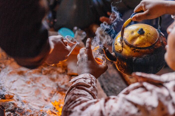 Drink tea with locals in a Jordanian Bedouin home