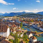 Aerial view of Lucerne's Old Town and the iconic "Kapellbrücke" (Chapel Bridge) over the Ruess River