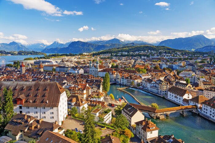 Aerial view of Lucerne's Old Town and the iconic "Kapellbrücke" (Chapel Bridge) over the Ruess River