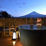 Soak in your own private hot tub with views of Mount Fuji (photo courtesy of Hotel Konansou)