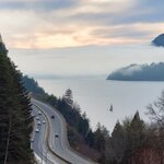 The Sea to Sky Highway in winter with Howe Sound in the background