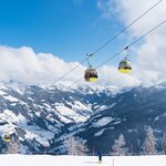 Cable cars carrying skiers into the mountains of Grossarl, Austria