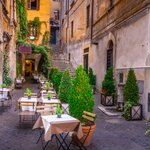 Skip the touristy eateries and dine in local neighborhoods like Rome's Trastevere