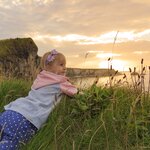 Admire the sunset over the Irish coast with the kids