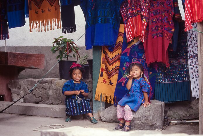 The kids can learn the art of Guatemala's artisanal textiles