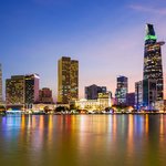 The twinkling lights of Ho Chi Minh City as seen from the Saigon River