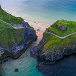Walk across the Carrick-a-Rede Rope Bridge while exploring the Antrim Coast