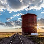 Enjoy views of the prairie grasslands on a train ride to Churchill
