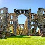 Explore England's Yorkshire's and Northumberland's history with a walk among the ruins of Rievaulx Abbey