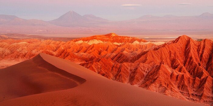 The sand dunes and rock formations of the Atacama Desert
