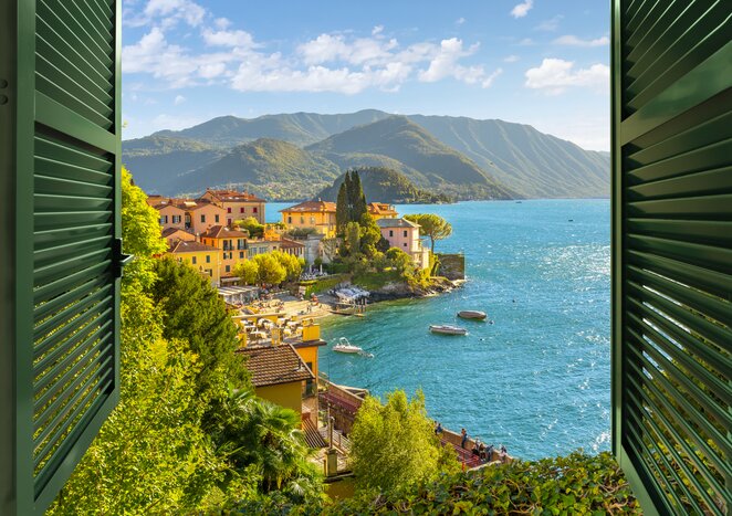 Take in the gorgeous scenery surrounding Varenna from a private vintage speedboat