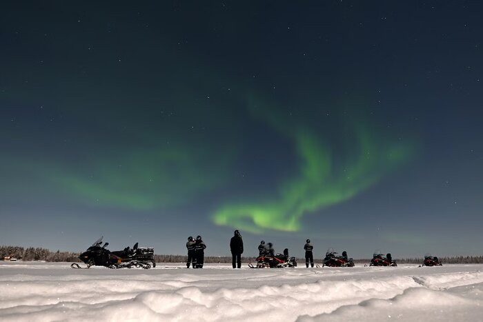 Auroras With Snowmobiles