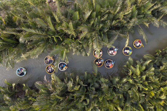 Visit Cam Thanh Village and enjoy a paddle amid the Bay Mau Palm Forest