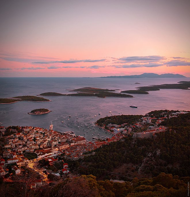Watch the setting sun over the Adriatic