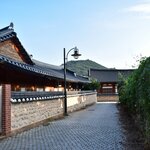 Visit famous K-drama filming locations like Jeonju Hanok Village, with traditional buildings