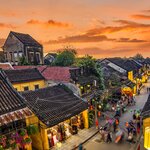 Spend two evenings walking the streets of Hoi An's Ancient Town at dusk