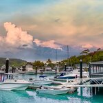 Boats moored in a Hamilton Island harbor