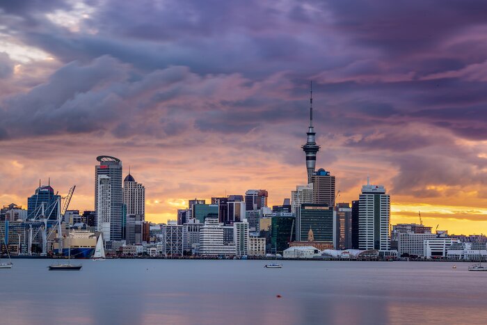 Auckland city skyline at sunset with Auckland Sky Tower