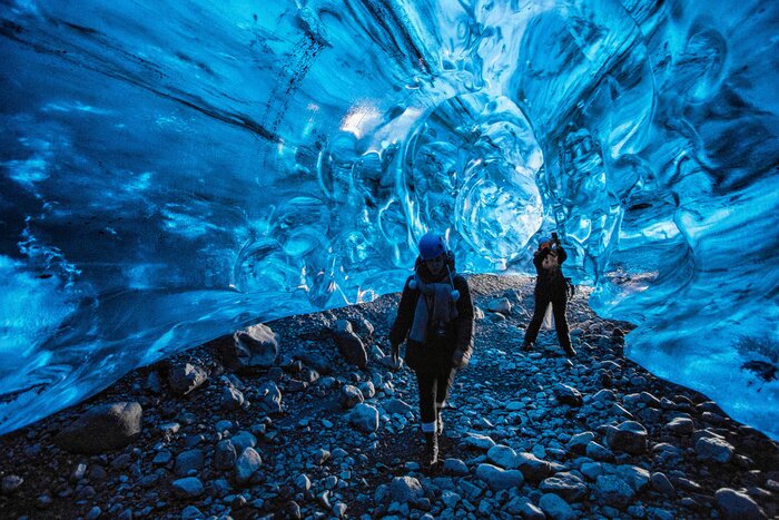 Wander through glacial ice caves on this 16-day Iceland adventure