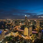 Marvel at the bright lights of lively Bangkok