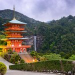 Follow an ancient stone path along the Kumano Kodo trail to see the Nachi Waterfall