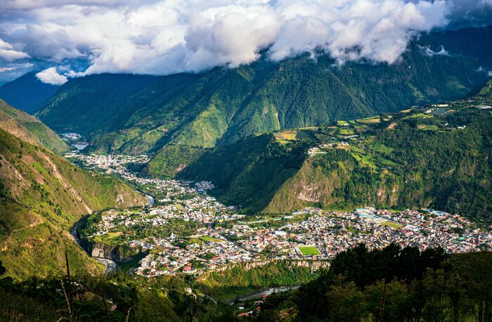 In Baños, enjoy adventure sports and natural hot springs when the weather is bright and dry in August