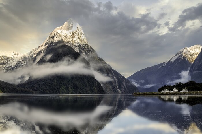 Cruise the glassy waters of Milford Sound / Piopiotahi, a fjord on New Zealand's South Island