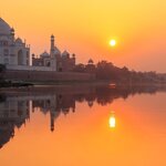 Experience the Taj Mahal, one of the Seven Wonders of the New World, at sunrise