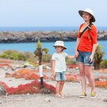 Mother and two kids hiking on the Galápagos Islands