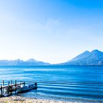 Relax on Lake Atitlán and relish the surrounding views of three impressive volcanoes