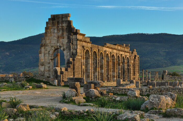 Discover Morocco's ancient Roman ruins of Volubilis, a sprawling complex