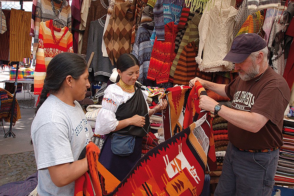 Bargaining at the traditional market of Otavalo