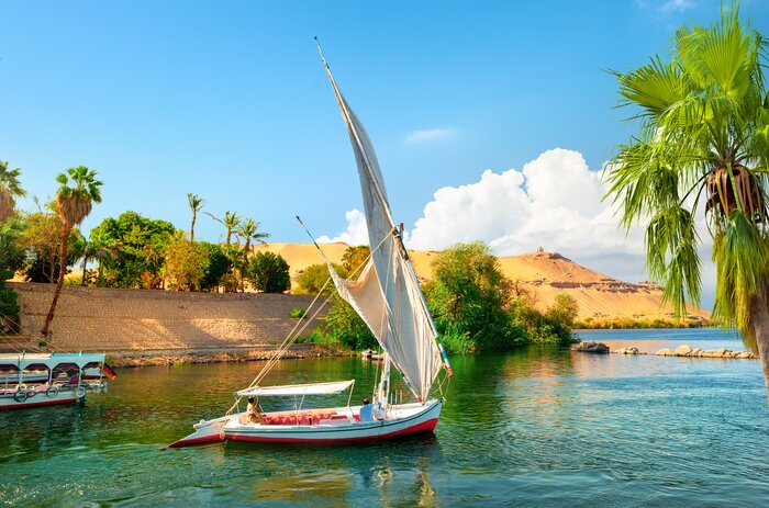 Sit back and enjoy the views as you cruise the Nile from Aswan to Luxor