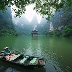 See the dramatic scenery of the Ninh Binh province on a boat tour