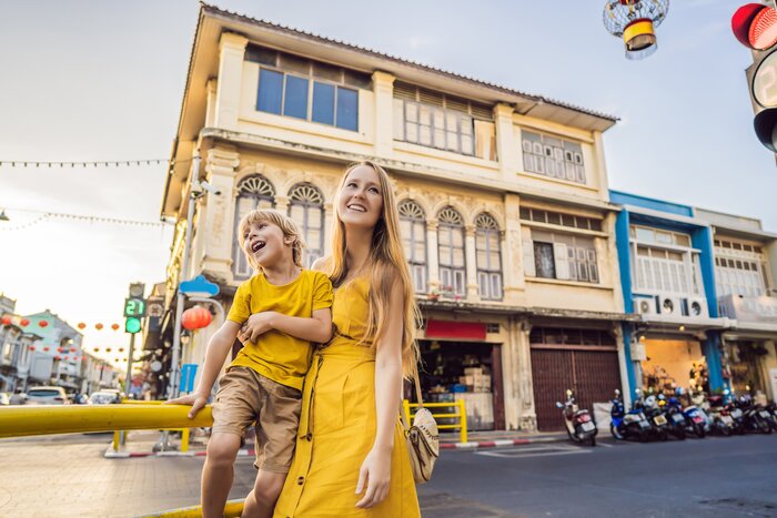 Mother and son in Phuket town, Thailand