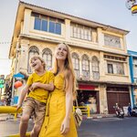 Mother and son in Phuket town, Thailand