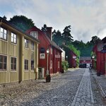 Pick up your rental car and drive to Eksjö, notable as one of the best-preserved old wood towns in Sweden