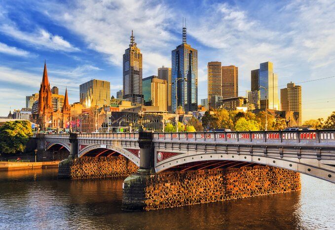 Take in the warm morning light on Melbourne's high-rise buildings across the Yarra River