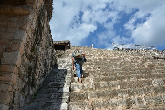 Climb to the highest ruins of Ek' Balam, an ancient Maya site once lost to the dense jungle
