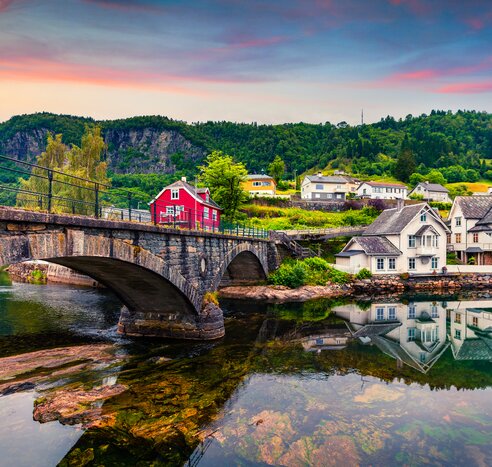 Discover quaint villages like Norheimsund, on the idyllic Hardangerfjord