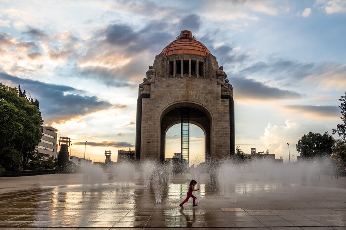 Let the kids burn some energy at the water fountain in front of Monument to the Mexican Revolution (Monumento a la Revolucion), Mexico City
