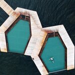 Iceland's only floating infinity pools are built within Lake Urriðavatn (photo courtesy of Vök Baths)