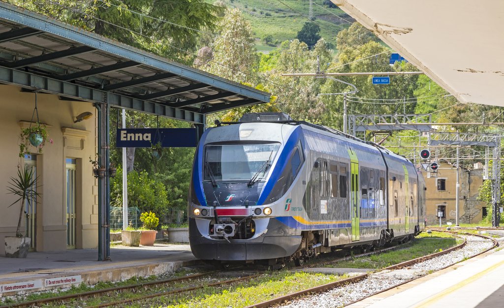 Train arrives to Enna railway station near Sicily