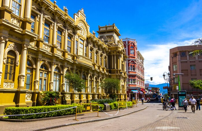 A colorful street in Costa Rica's San José, including the correos (post office)