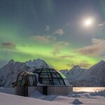 Spot the northern lights from ice hotels and glass igloos as you adventure above the Arctic Circle (photo courtesy of Lyngen North)