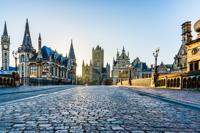 Skyline of Ghent's landmarks seen from St. Michael's Bridge at sunrise