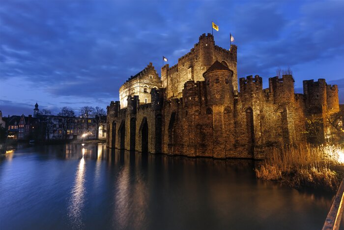 Twilight over the majestic 10th-century Gravensteen Castle