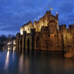 Twilight over the majestic 10th-century Gravensteen Castle 