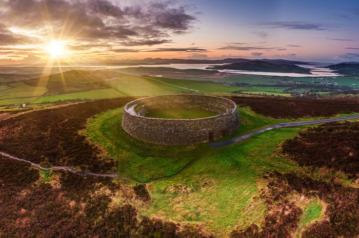 Catch the sunset at historic Grianan of Aileach, a ring fort in Donegal